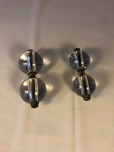 Two pairs of old shop door handles.