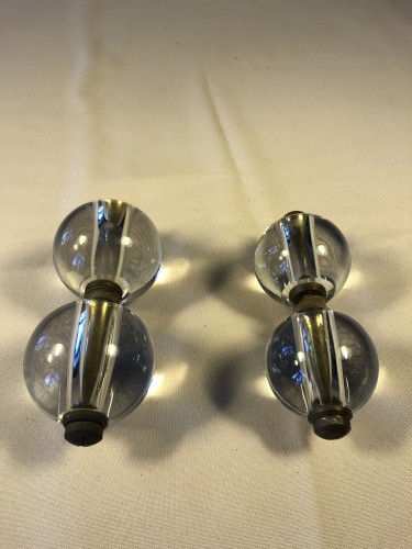 Two pairs of old shop door handles.