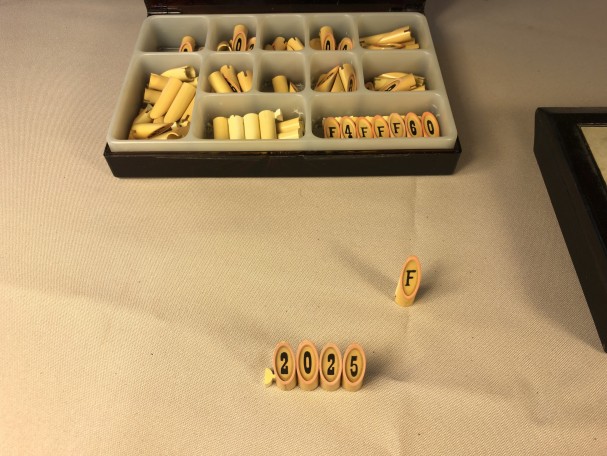 Two boxes of display figures.