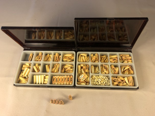 Two boxes of display figures.