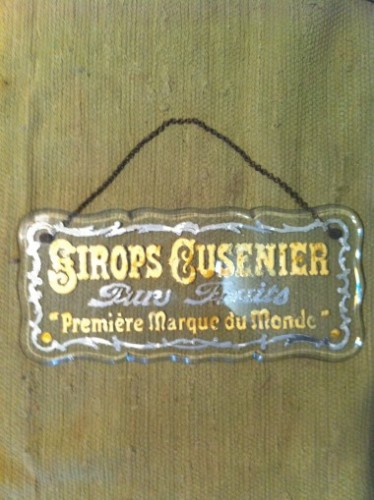 Vintage advertising glass plaque
