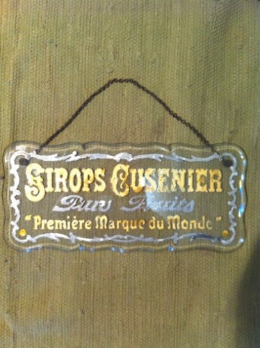 Vintage advertising glass plaque