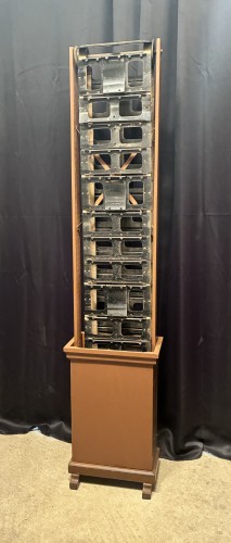Antique postcard display stand.