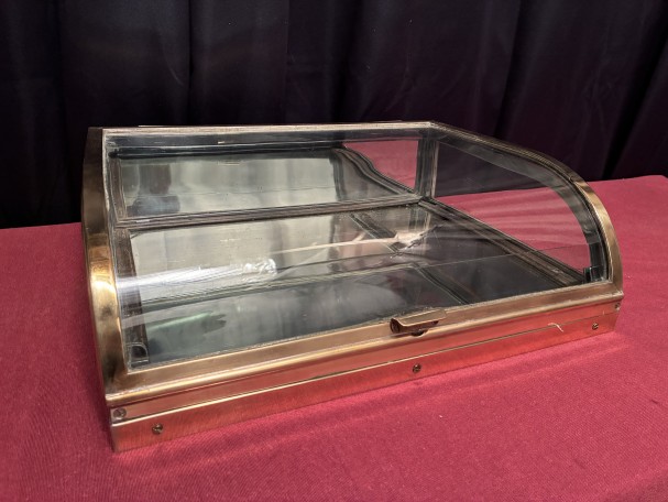 Small antique shop counter display case.