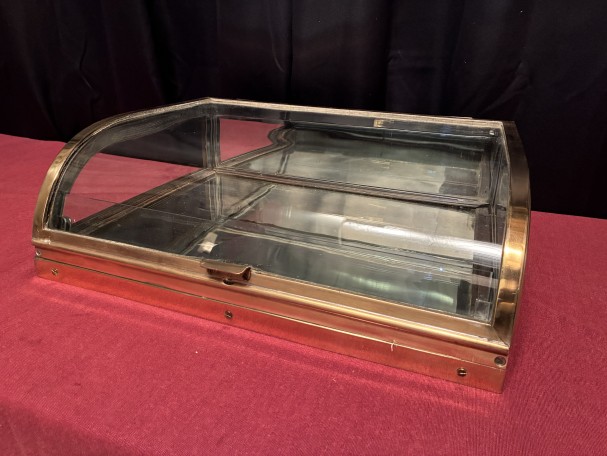 Small antique shop counter display case.