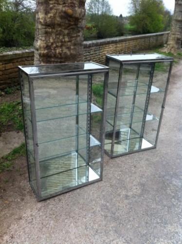 Pair of chromed display cases