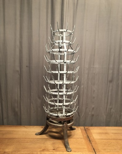 Antique bottle drainer.