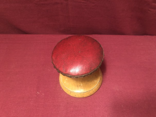 Old glover's cushion.