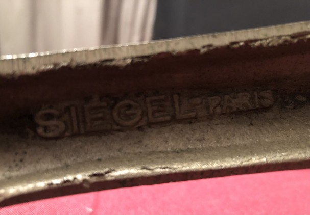 Siegel. Old store shelf brackets.