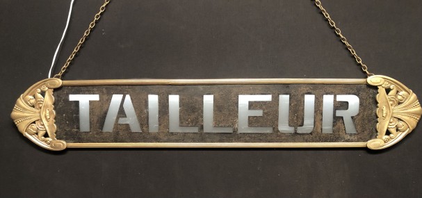 Old tailor's sign.