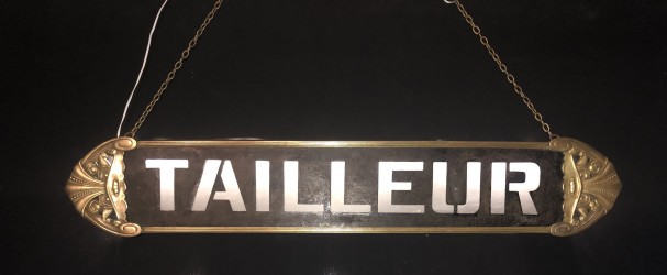 Old tailor's sign.
