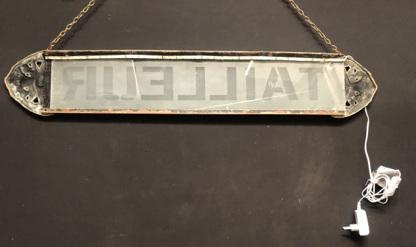 Old tailor's sign.