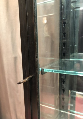 Pair of antique shop wall display cases.