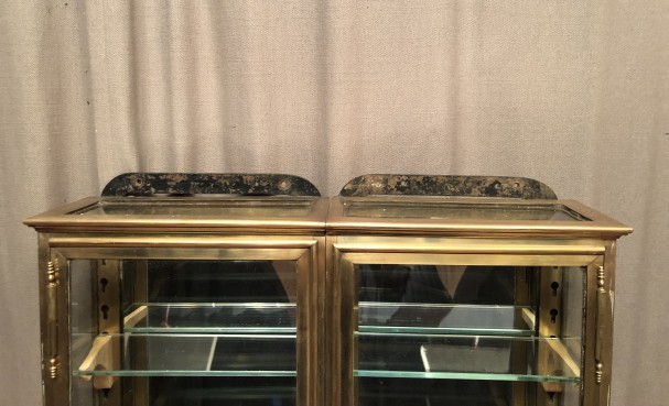 Pair of antique shop wall display cases.