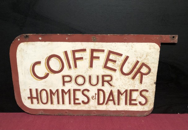 Old street sign. Hairdresser.