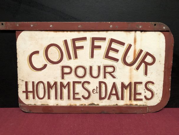 Old street sign. Hairdresser.