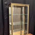 Small antique wall-mounted display case.