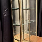 Small antique wall-mounted display case.