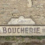 Former large shopfront sign.