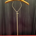 Vintage shop window clothing display stand.