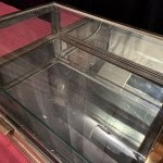 Small antique shop counter display case.