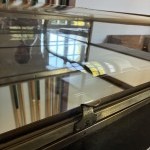 Antique shop counter display case.