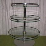 3 circular glass trays display