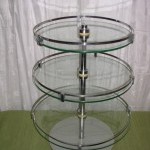 3 circular glass trays display