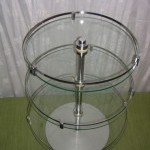 3 circular glass trays display