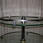 3 circular glass trays display