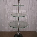 Three circular glass trays display