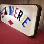 Old dry cleaners sign.