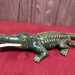 Old large earthenware crocodile.