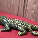 Old large earthenware crocodile.