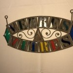 Old glazier's sign, stained glass maker.
