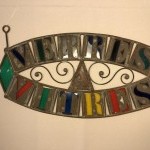 Old glazier's sign, stained glass maker.