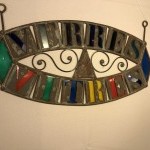 Old glazier's sign, stained glass maker.