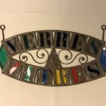 Old glazier's sign, stained glass maker.