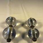 Two pairs of old shop door handles.