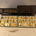Two boxes of display figures.