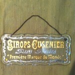 Vintage advertising glass plaque