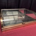 Small antique shop counter display case.