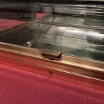 Small antique shop counter display case.