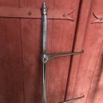 Pair of antique store shelf uprights.