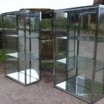 Pair of chromed display cases