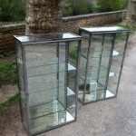 Pair of chromed display cases