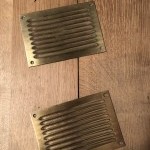 Pair of old cash register plates, change given.