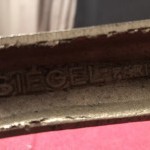 Siegel. Old store shelf brackets.