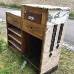 Former cash register and store presentation furniture.