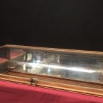 Old curved counter display case.